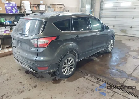 2017 Ford Escape Titanium z USA, uszkodzony, nr VIN 1FMCU9JD5HUC45335